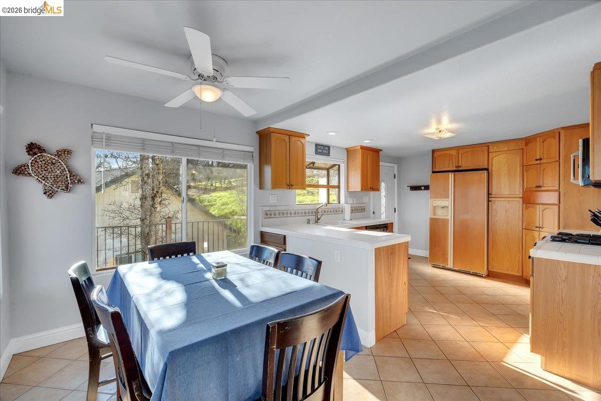 4620 Bayview Drive Copperopolis, CA 95228 - Photo 21 of 59 a view of a dining room with furniture window and outside view