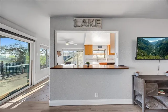 a bedroom with bed and a window