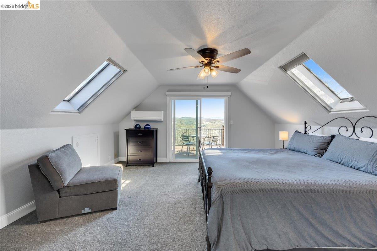 4620 Bayview Drive Copperopolis, CA 95228 - Photo 35 of 59 a bedroom with furniture and a ceiling fan