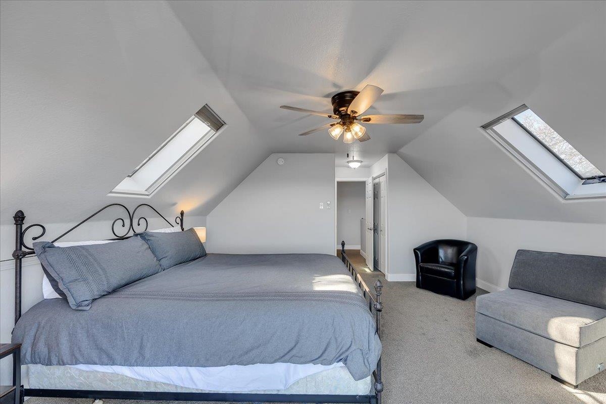 4620 Bayview Drive Copperopolis, CA 95228 - Photo 38 of 59 a bedroom with a bed and ceiling fan