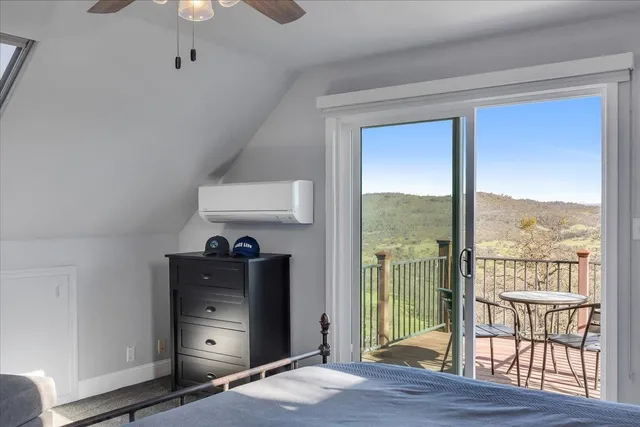an aerial view of a house with a swimming pool yard and outdoor seating