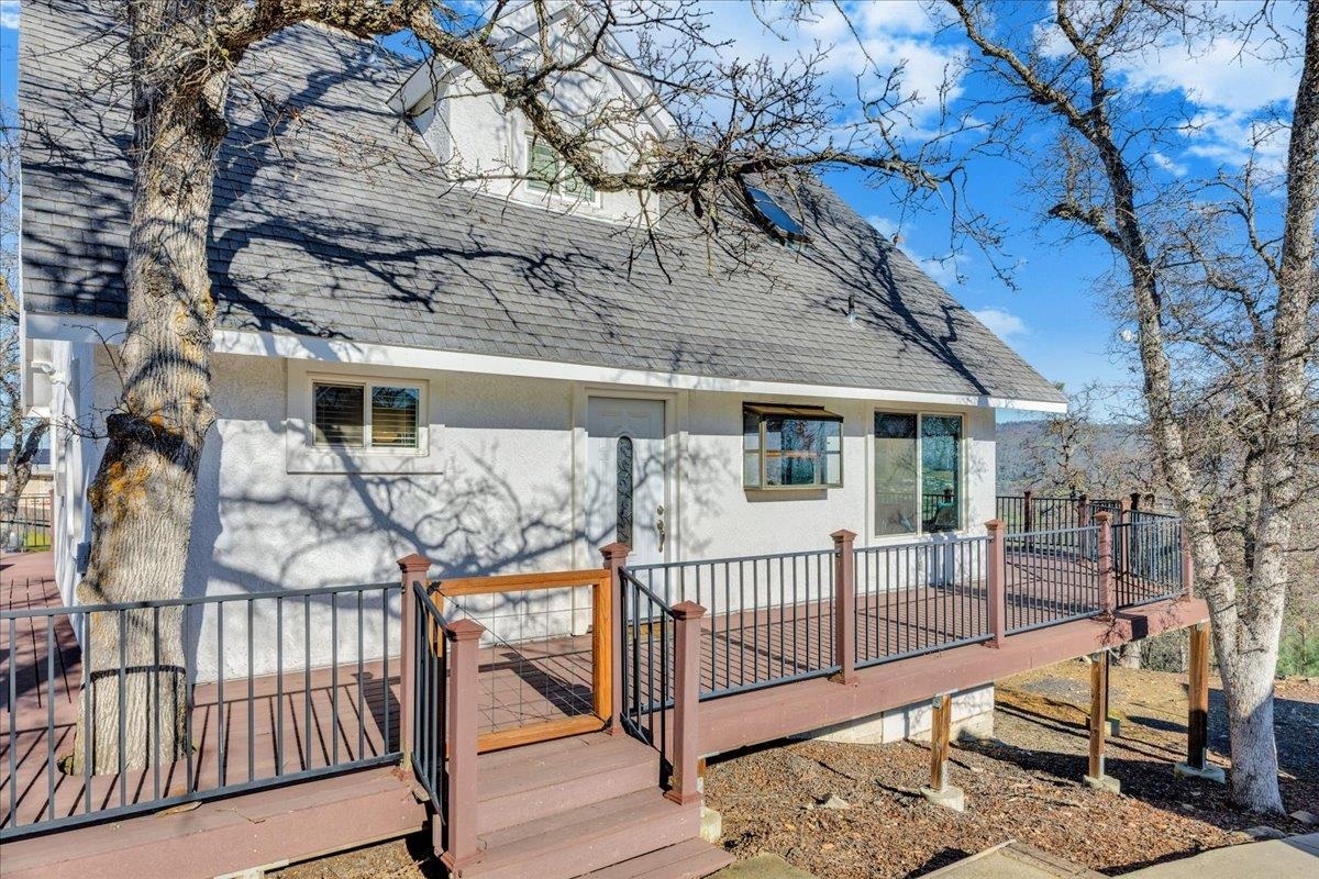 4620 Bayview Drive Copperopolis, CA 95228 - Photo 4 of 59 Back of property with roof with shingles, a wooden deck, and stucco siding