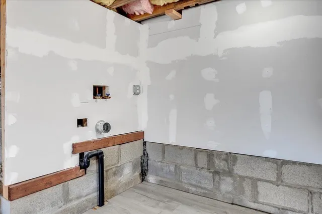 a view of a playground with basketball court