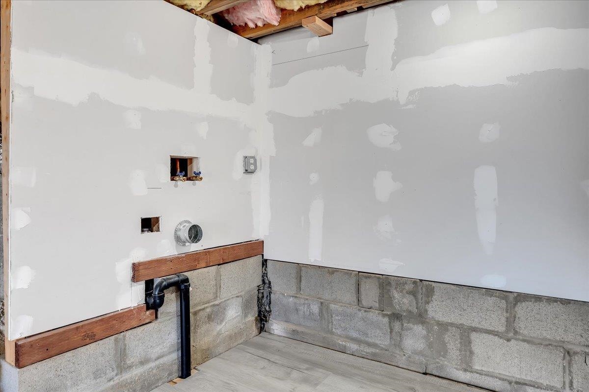 4620 Bayview Drive Copperopolis, CA 95228 - Photo 46 of 59 Washroom with washer hookup and concrete block wall