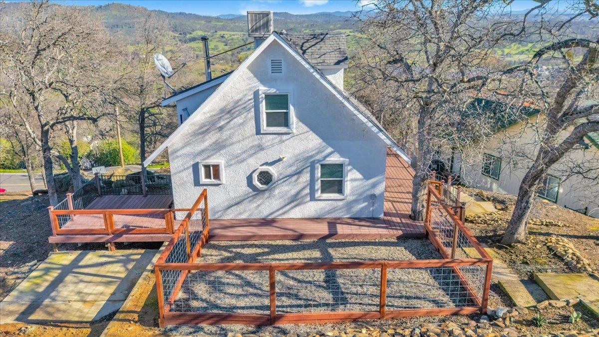 4620 Bayview Drive Copperopolis, CA 95228 - Photo 7 of 59 View of side of property with a deck