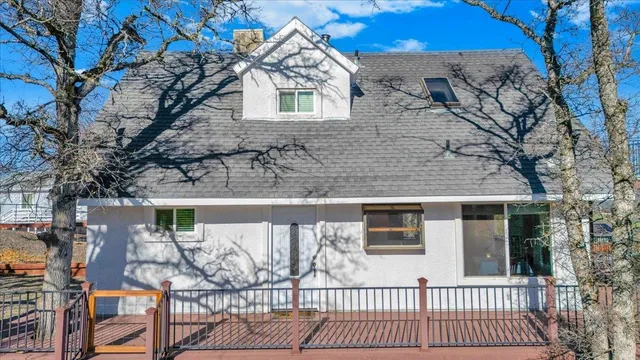a view of a balcony with an ocean