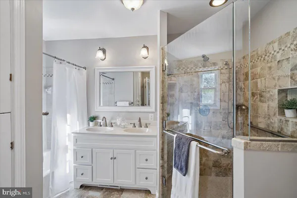 a balcony with wooden floor and trees