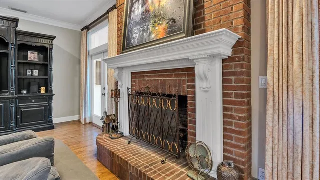 a kitchen with granite countertop a sink and cabinets