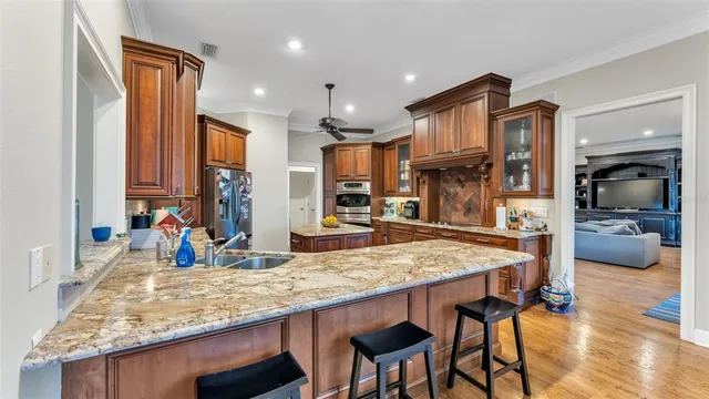 a view of an entryway with wooden floor