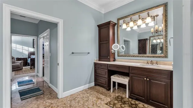 a bedroom with a bed and a tv