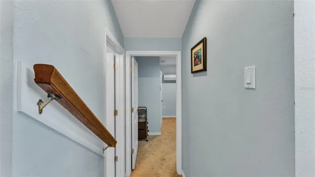 a view of a dining room with furniture and window