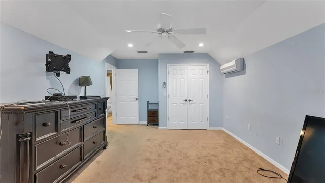 a view of a house with backyard and garage