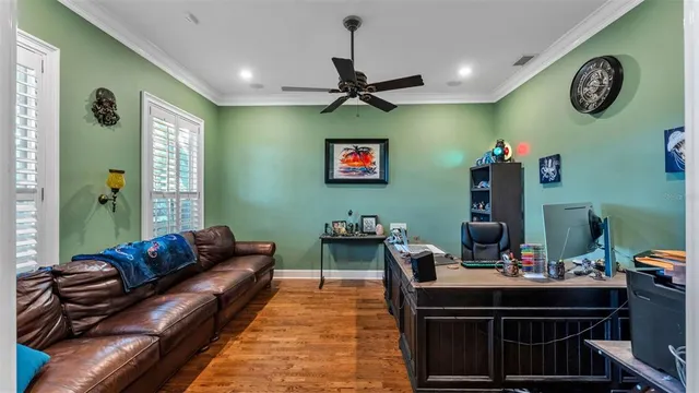 a living room with fireplace furniture and a flat screen tv
