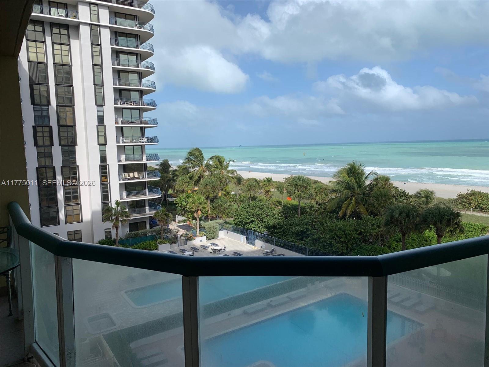 8855 Collins Avenue, Unit 5B Surfside, FL 33154 - Photo 18 of 35 a view of a balcony and lake view