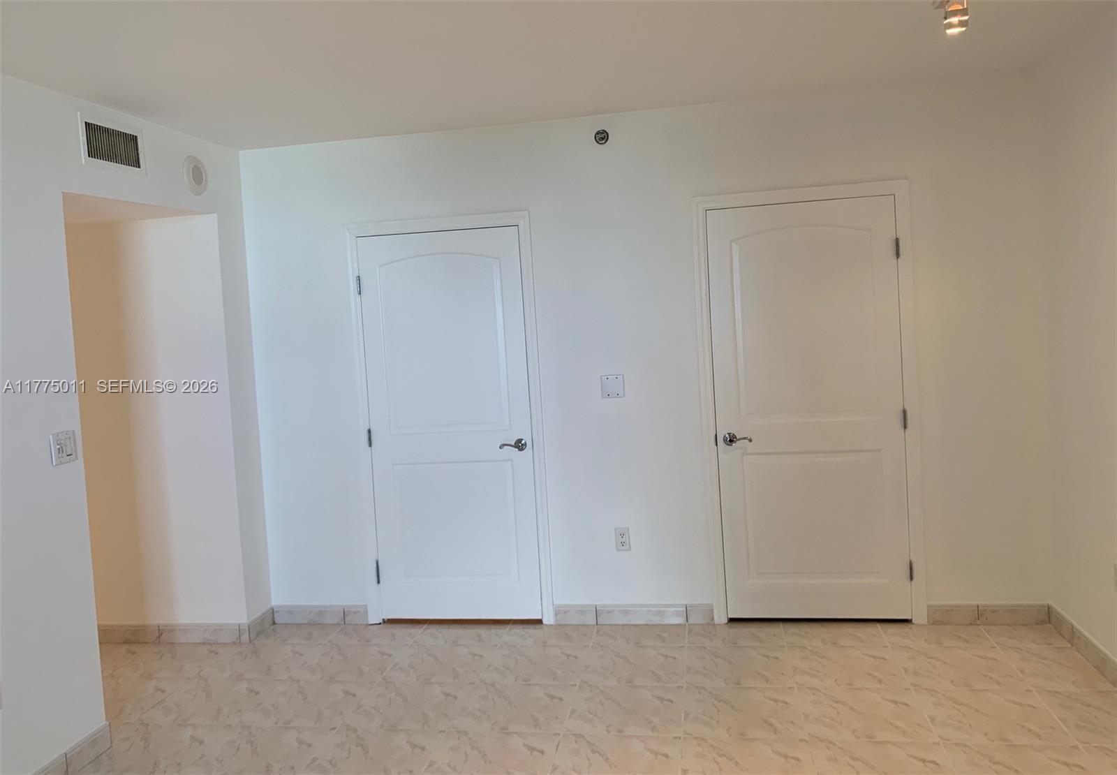 8855 Collins Avenue, Unit 5B Surfside, FL 33154 - Photo 19 of 35 a view of an empty room