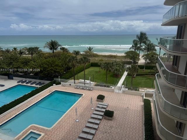 8855 Collins Avenue, Unit 5B Surfside, FL 33154 - Photo 34 of 35 a view of a backyard with sitting area