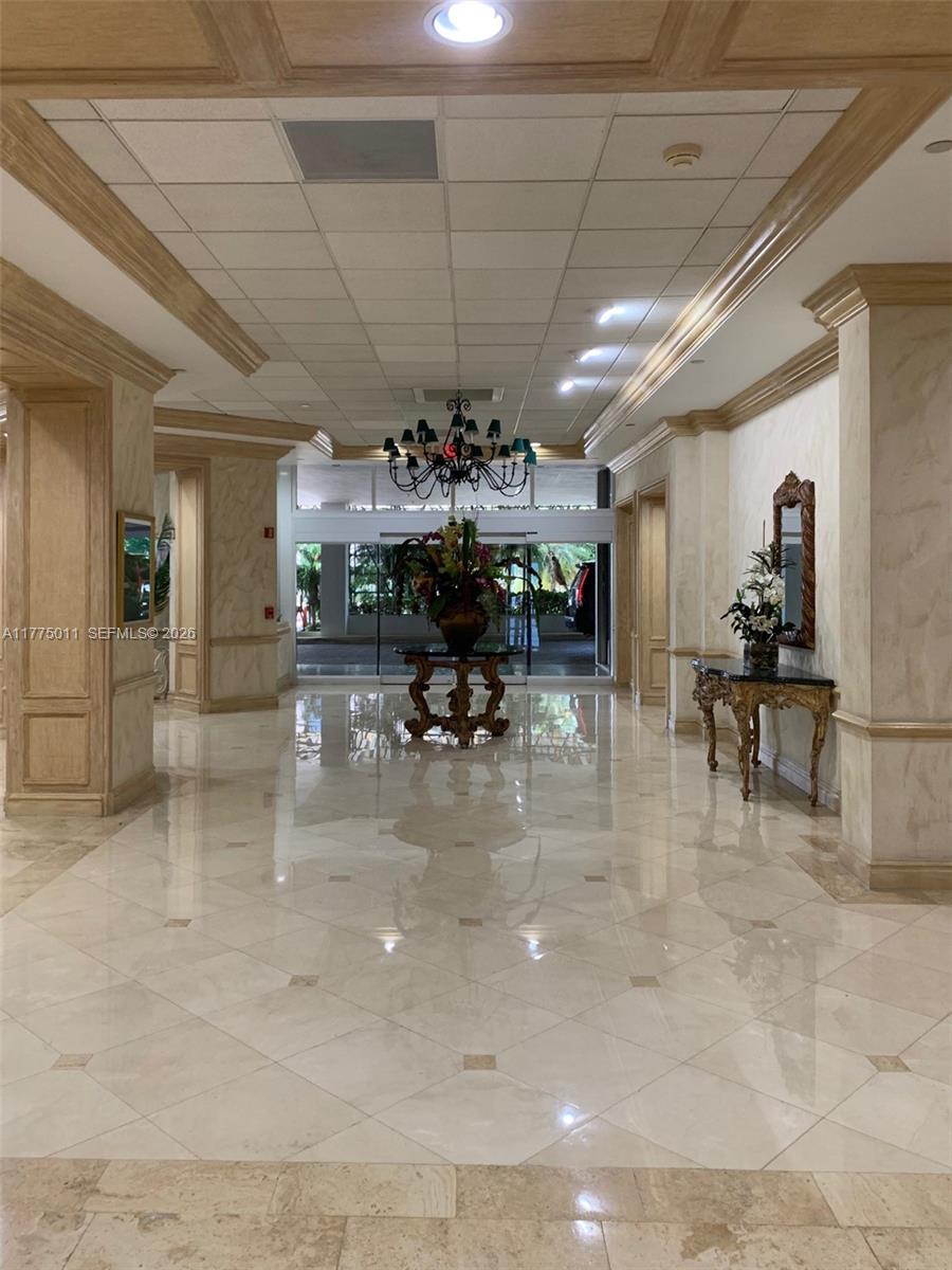 8855 Collins Avenue, Unit 5B Surfside, FL 33154 - Photo 5 of 35 a view of a entryway with a room