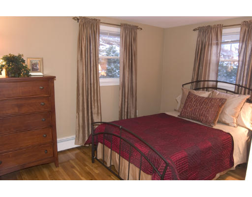 8 George Road Winchester, MA 01890 - Photo 9 of 9 a bedroom with a bed and a dresser