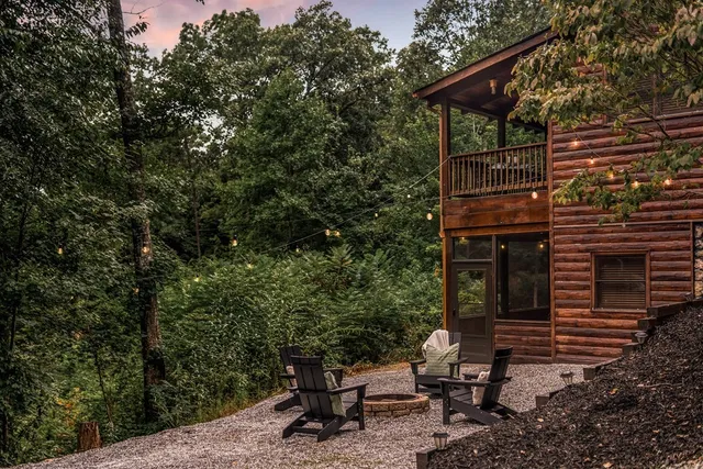 a backyard of a house with outdoor seating