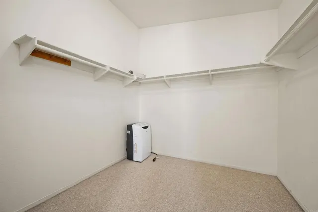 a view of small space with racks on the wall