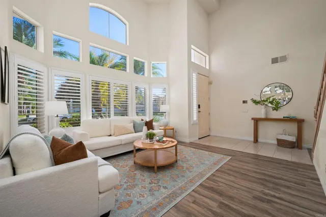 a living room with furniture and window