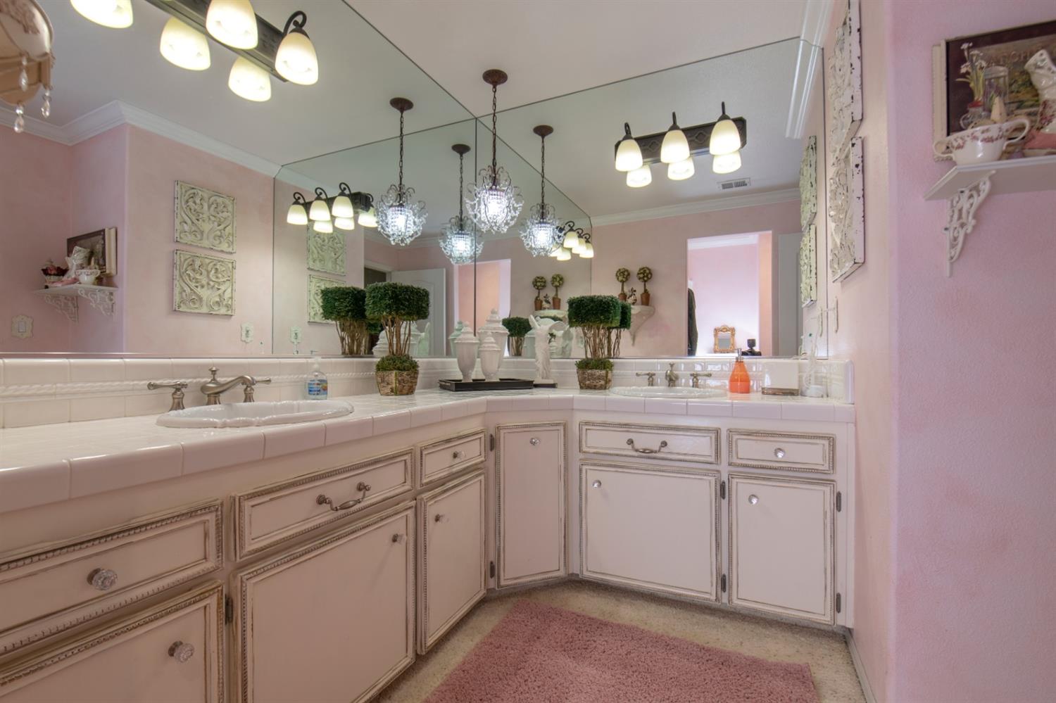2873 Carolina Avenue Clovis, CA 93611 - Photo 19 of 23 a bathroom with a sink vanity and a mirror