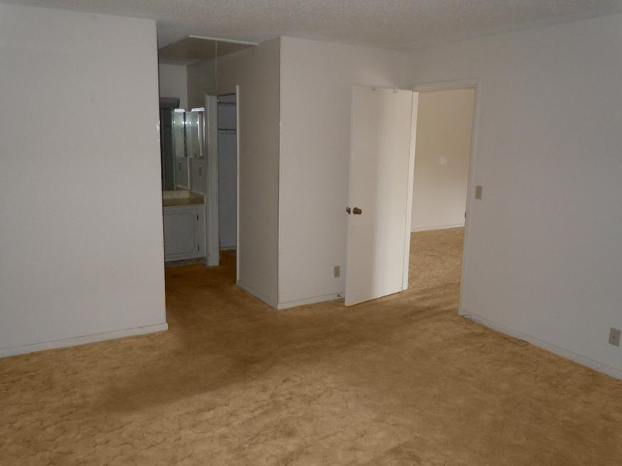 727 High Point Boulevard, Unit A Fort Pierce, FL 34982 - Photo 14 of 24 Master Bedroom&Bath Entrance