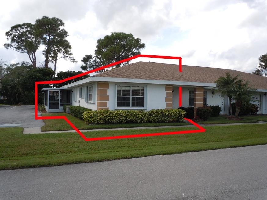 727 High Point Boulevard, Unit A Fort Pierce, FL 34982 - Photo 22 of 24 Patio & Bldg Side View