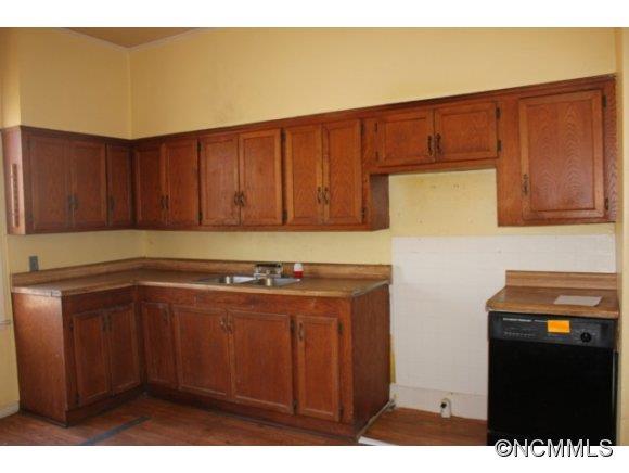 149 Grace Street Rutherfordton, NC 28139 - Photo 8 of 10 a kitchen with a sink and cabinets