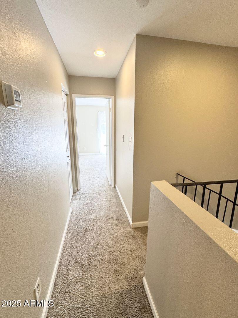 1425 East Desert Cove Avenue, Unit 2 Phoenix, AZ 85020 - Photo 23 of 42 a view of hallway with stairs