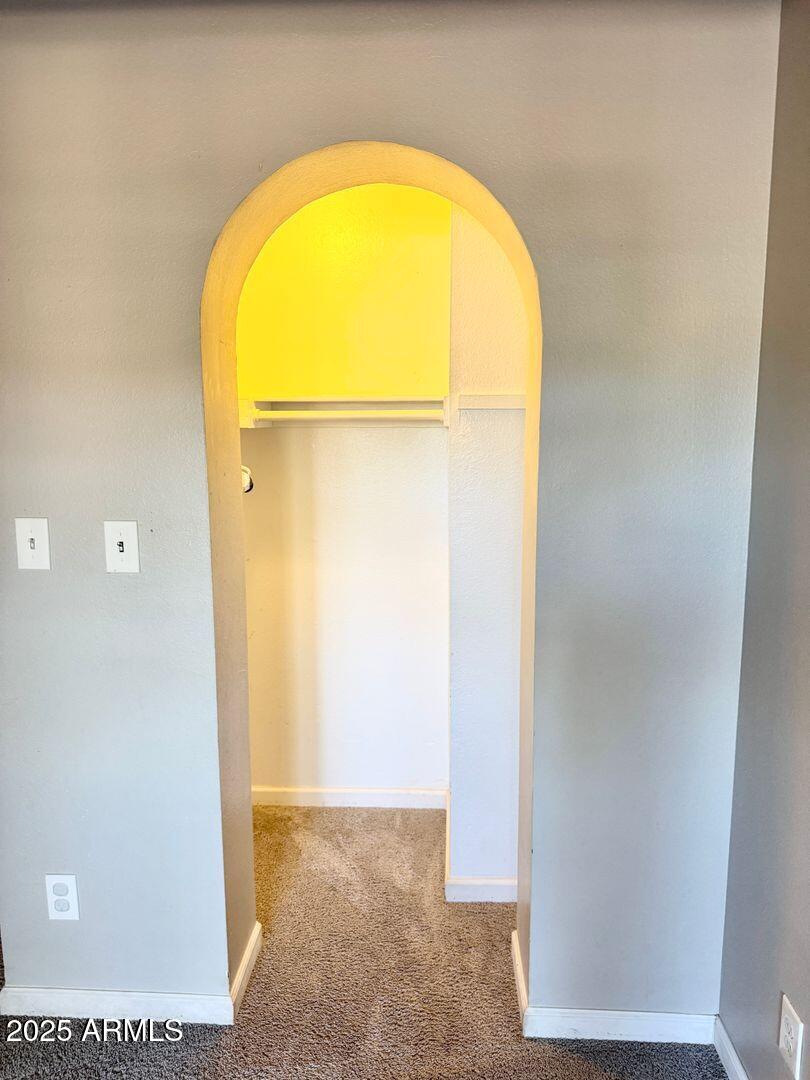 1425 East Desert Cove Avenue, Unit 2 Phoenix, AZ 85020 - Photo 27 of 42 a view of a room with painted walls and a window