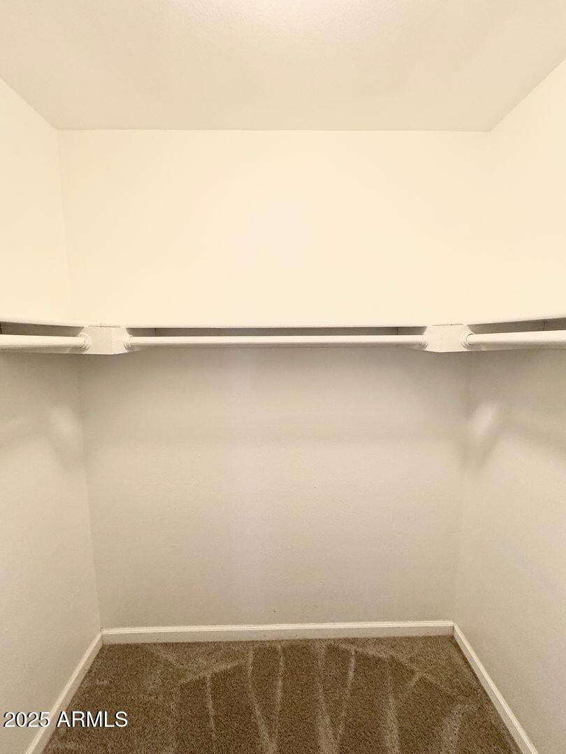 1425 East Desert Cove Avenue, Unit 2 Phoenix, AZ 85020 - Photo 28 of 42 a view of small space with racks on the wall