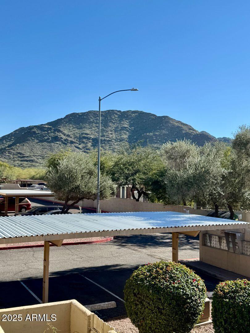 1425 East Desert Cove Avenue, Unit 2 Phoenix, AZ 85020 - Photo 37 of 42 a view of a chairs and table on the terrace