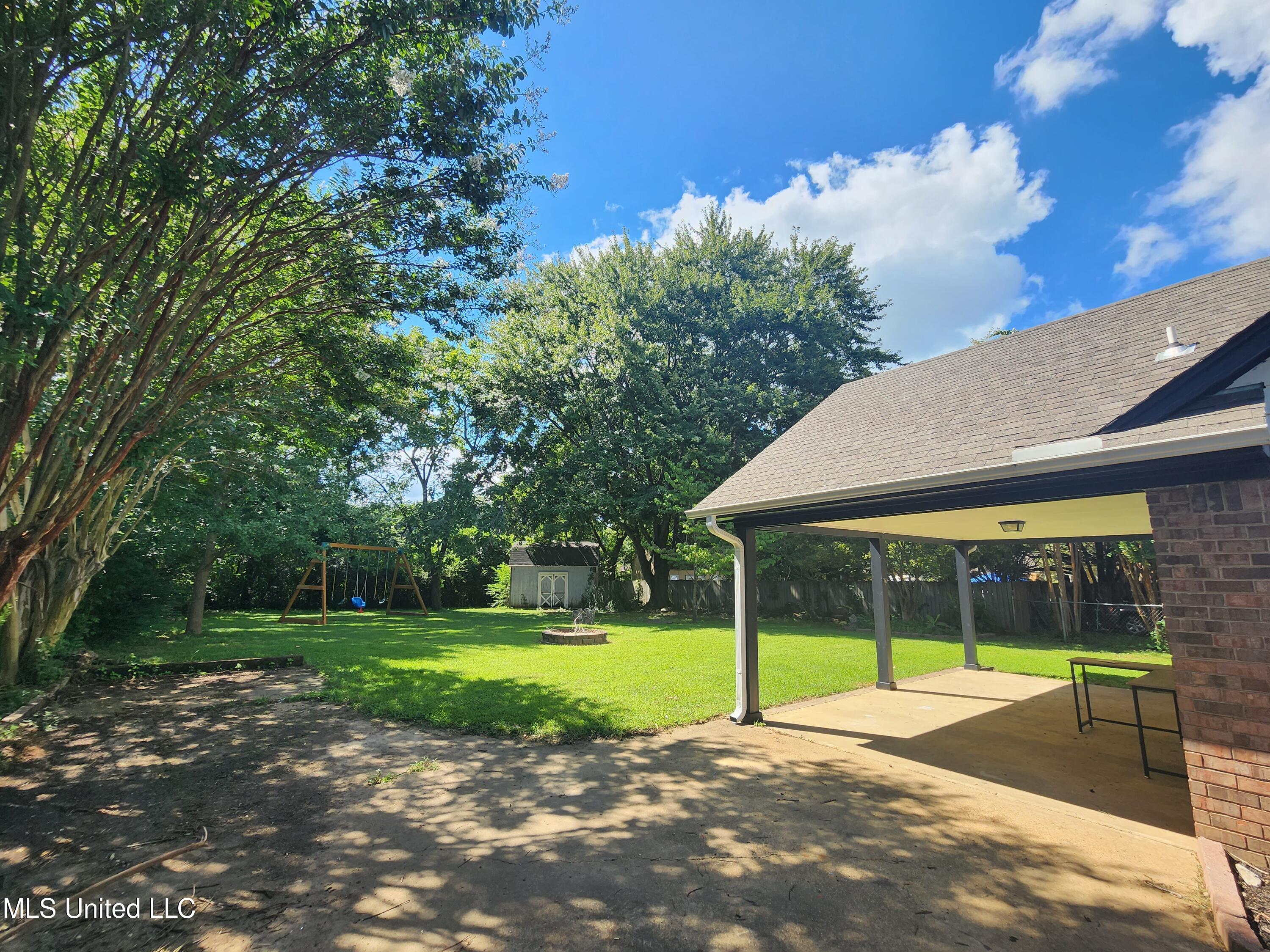 6901 Alexander Road Olive Branch, MS 38654 - Photo 12 of 15 Carport and extra Driveway