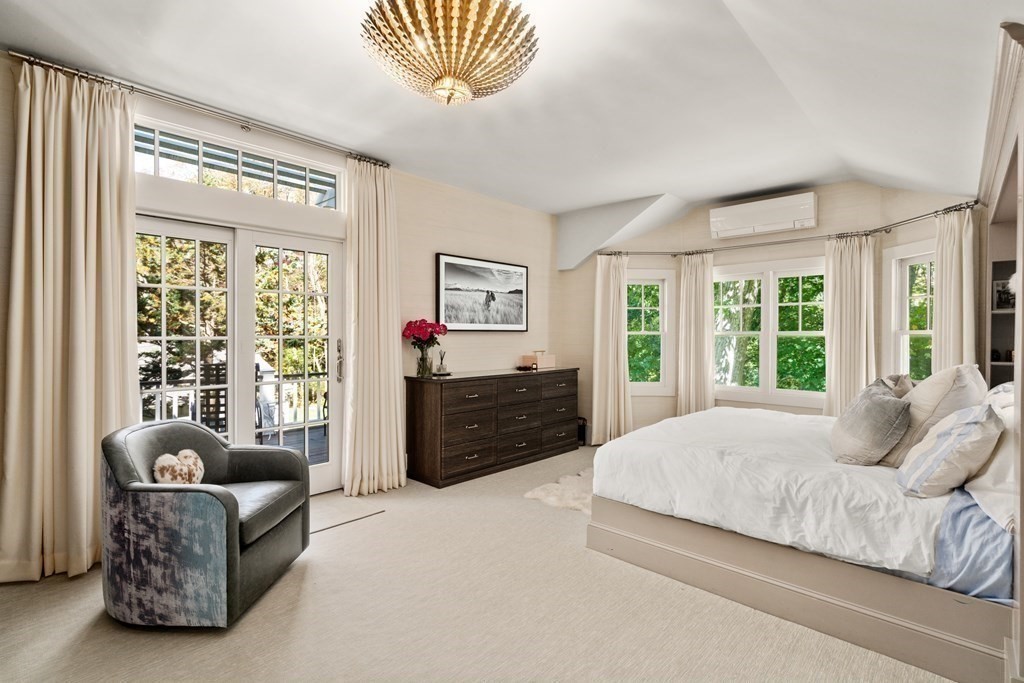 88 Pine Street Dover, MA 02030 - Photo 19 of 40 a bedroom with a bed and a couch