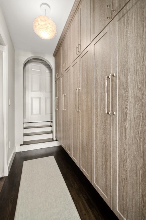 88 Pine Street Dover, MA 02030 - Photo 20 of 40 a view of a closet area with wooden floor