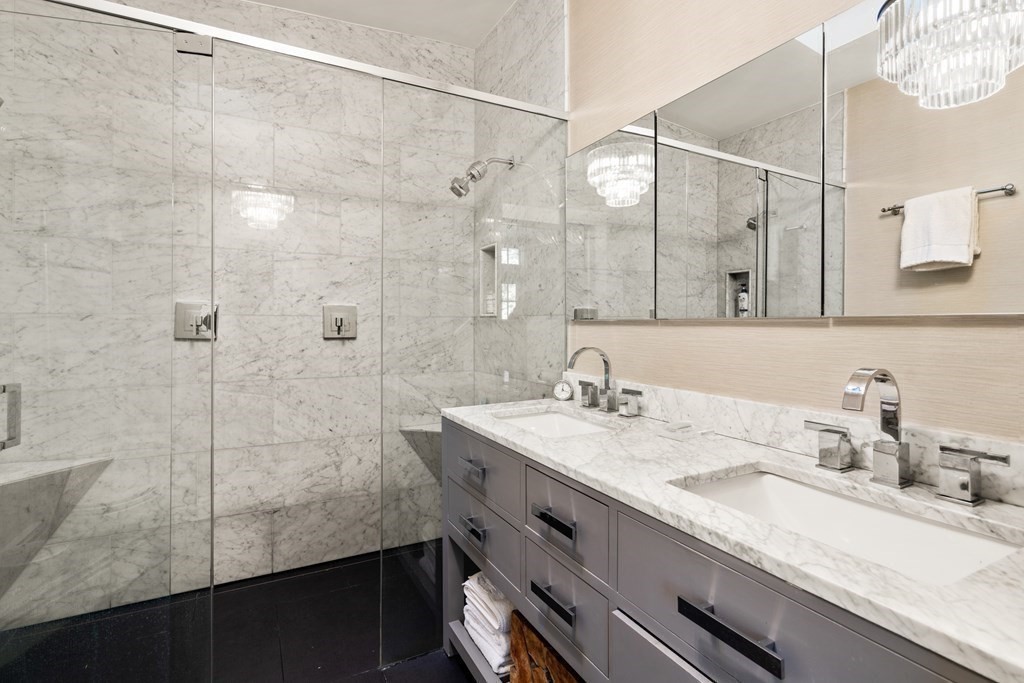 88 Pine Street Dover, MA 02030 - Photo 21 of 40 a bathroom with a granite countertop sink a mirror and shower