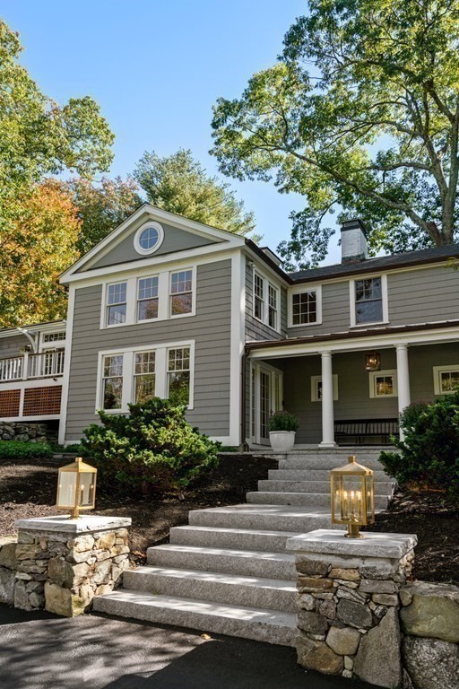 88 Pine Street Dover, MA 02030 - Photo 32 of 40 a front view of a house with yard