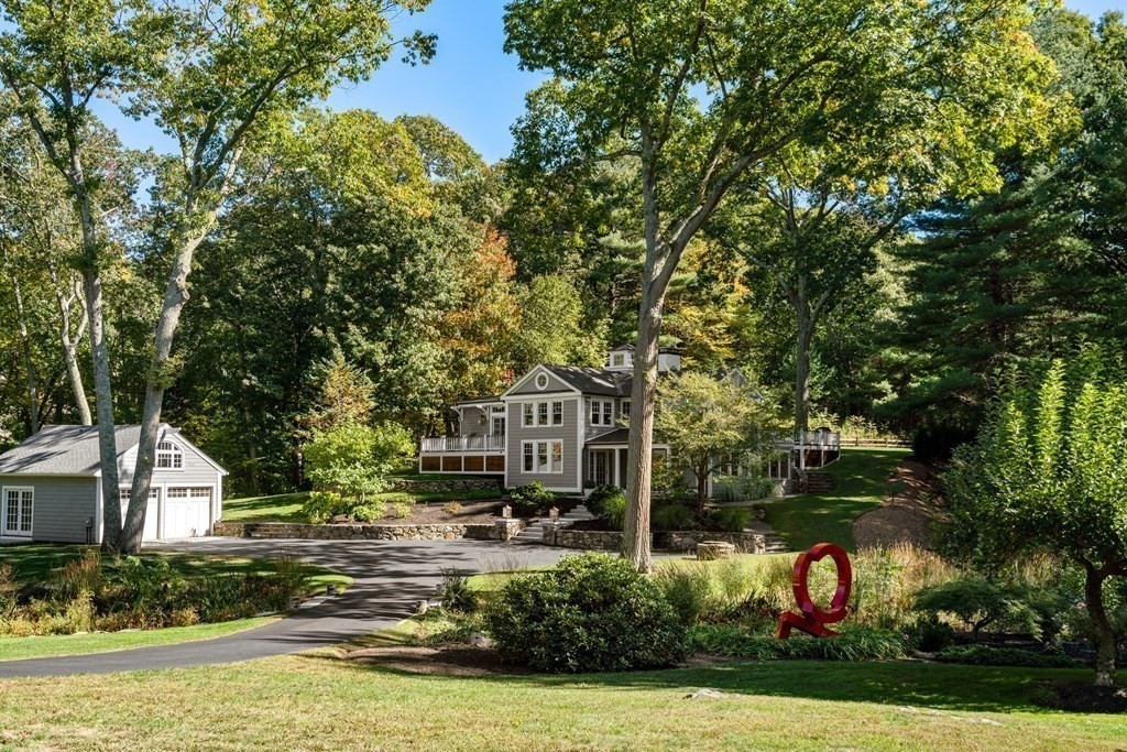 88 Pine Street Dover, MA 02030 - Photo 4 of 40 a view of a house with a yard