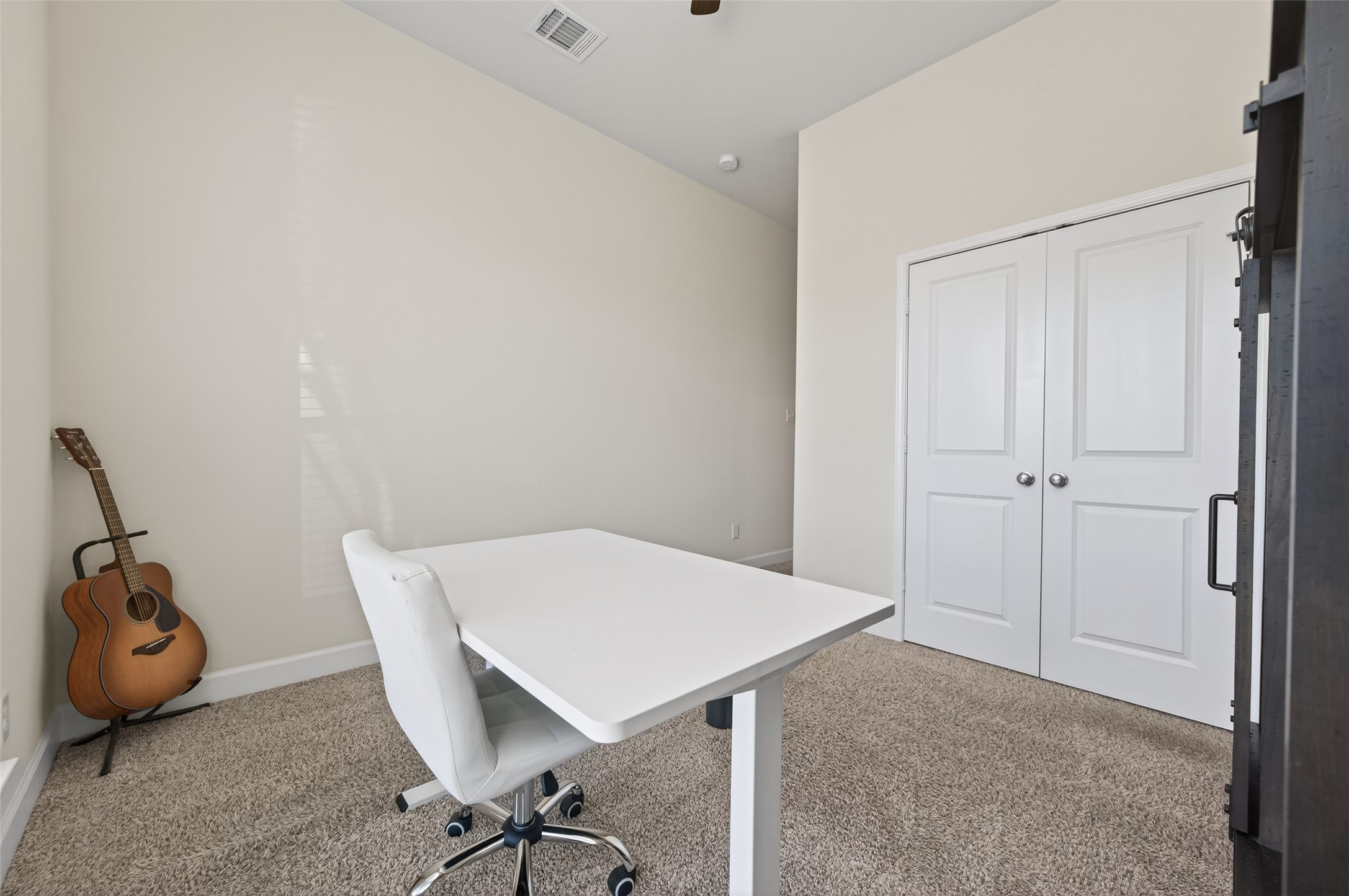 917 Farm Path Brenham, TX 77833 - Photo 27 of 43 a view of a workspace with furniture