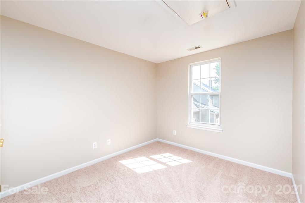 840 Knightsbridge Road Fort Mill, SC 29708 - Photo 22 of 32 an empty room with a window