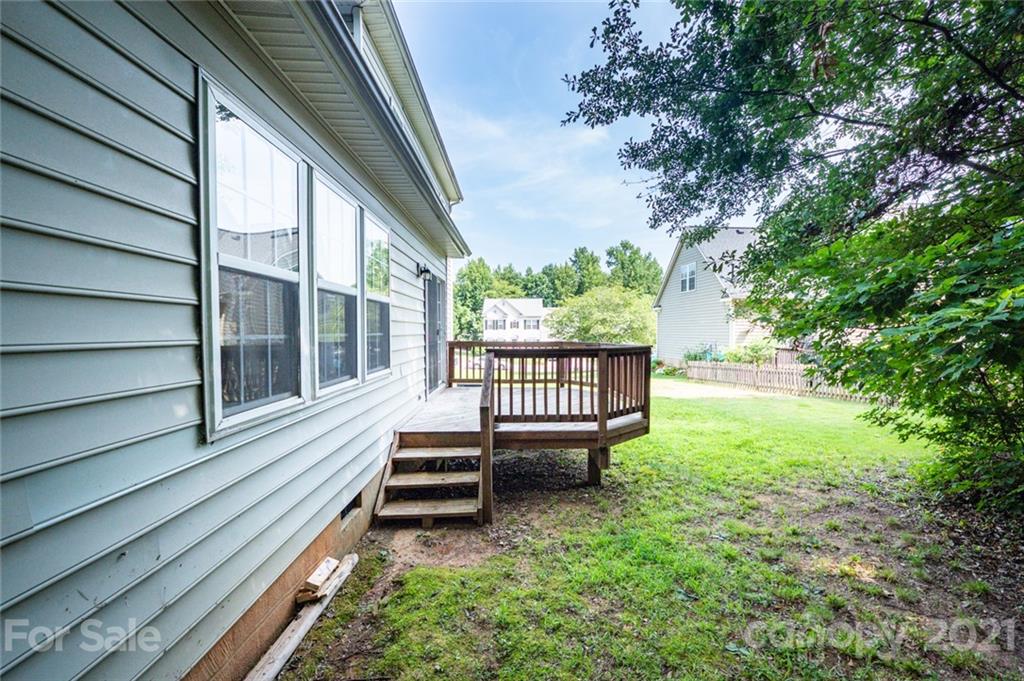 840 Knightsbridge Road Fort Mill, SC 29708 - Photo 26 of 32 a view of a back yard of the house