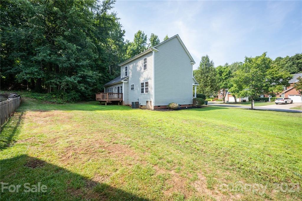 840 Knightsbridge Road Fort Mill, SC 29708 - Photo 29 of 32 a view of a house with a yard