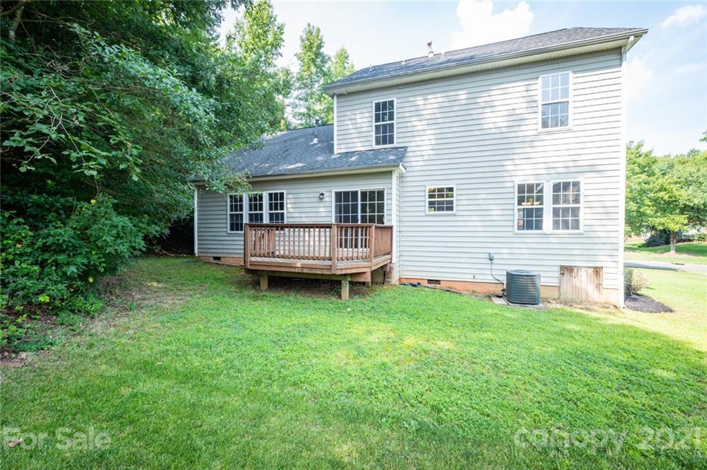 840 Knightsbridge Road Fort Mill, SC 29708 - Photo 30 of 32 a view of backyard with a garden and deck