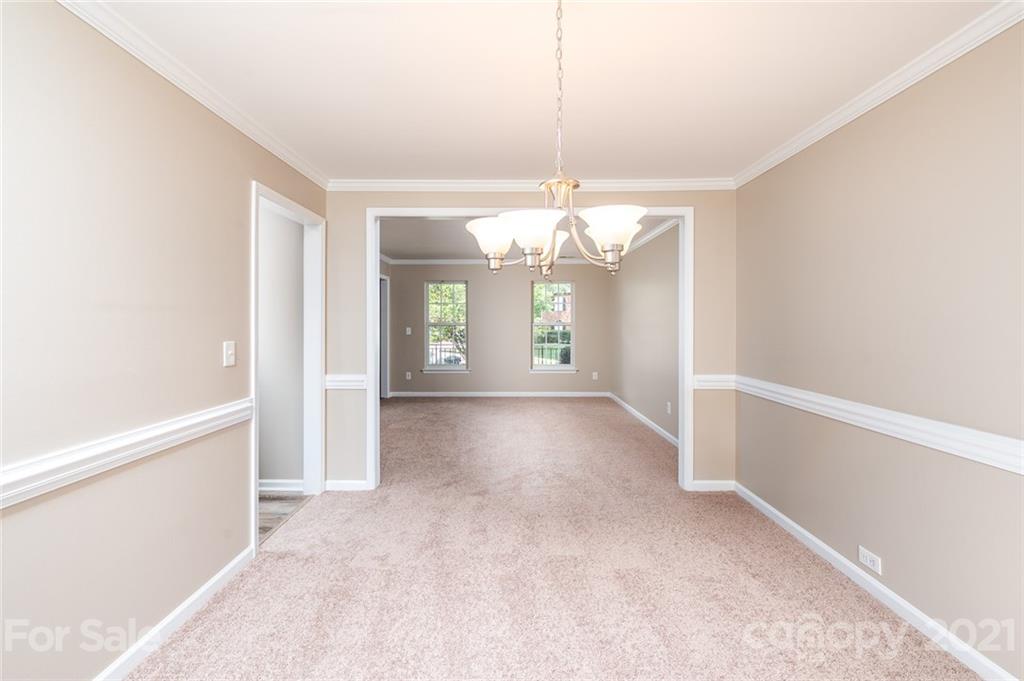840 Knightsbridge Road Fort Mill, SC 29708 - Photo 6 of 32 wooden floor in an empty room with a window
