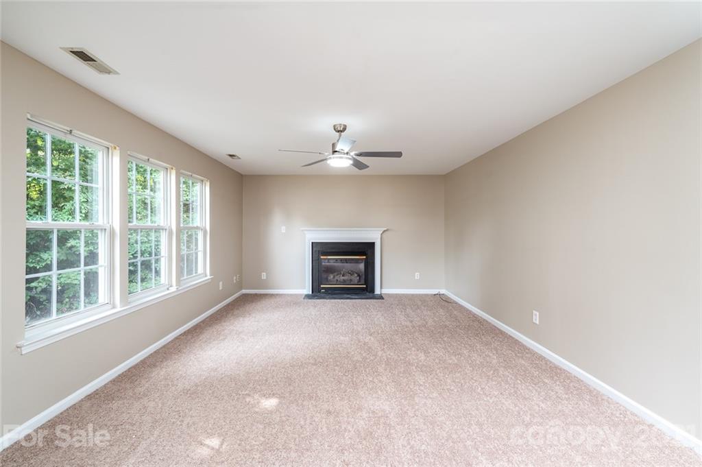 840 Knightsbridge Road Fort Mill, SC 29708 - Photo 8 of 32 a view of an empty room with a window
