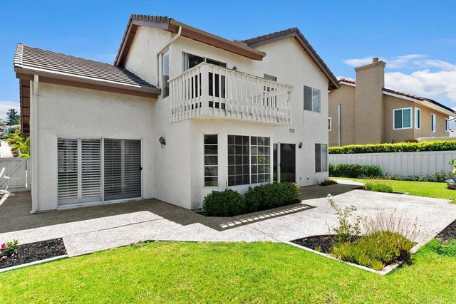 a view of a backyard with a garden