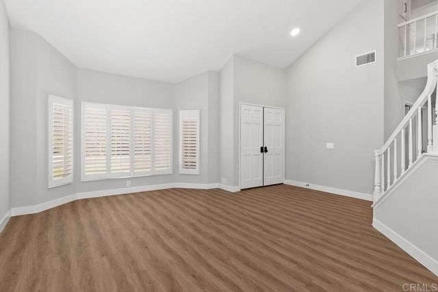 a kitchen with a sink and a window