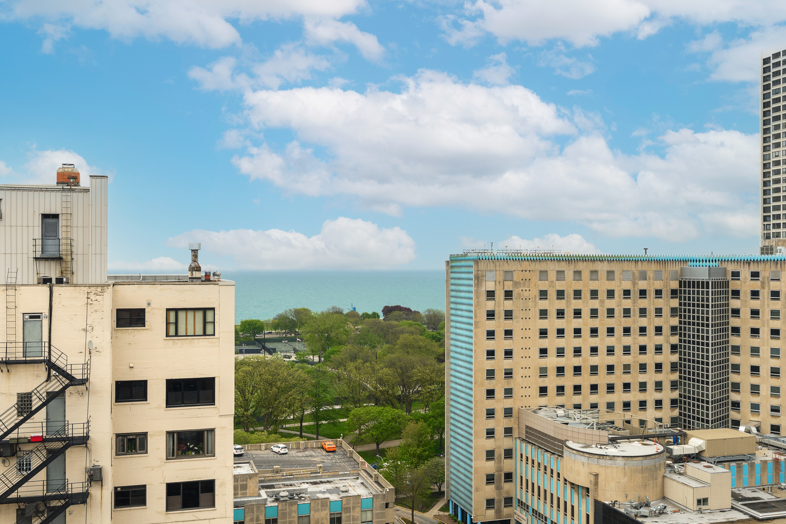 2909 North Sheridan Road, Unit 1803 Chicago, IL 60657 - Photo 12 of 16 a view of a building with a yard