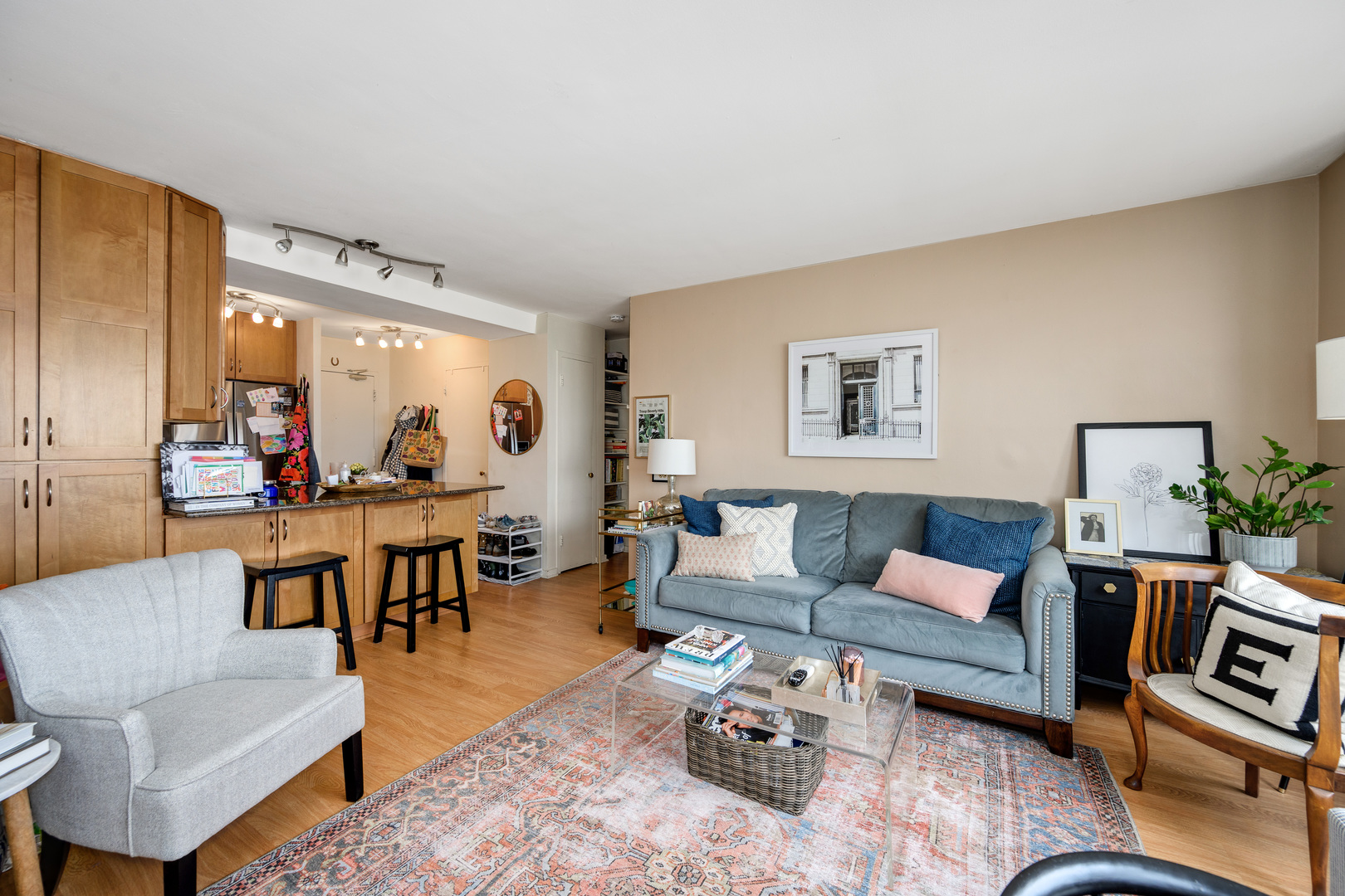 2909 North Sheridan Road, Unit 1803 Chicago, IL 60657 - Photo 4 of 16 a living room with furniture and a large window